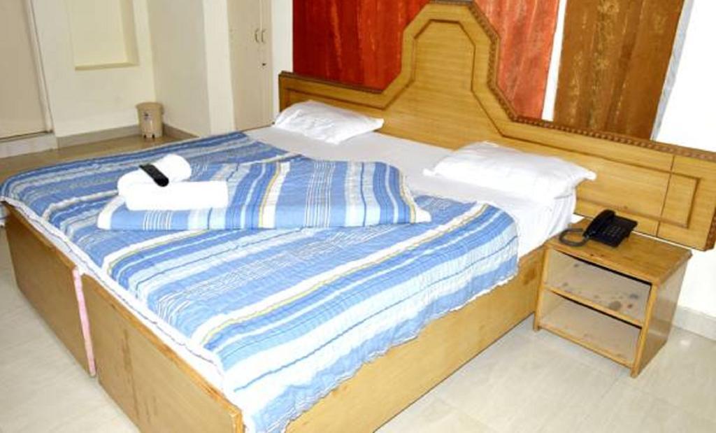 Hotel Bhajgovindam Haridwār Стая снимка